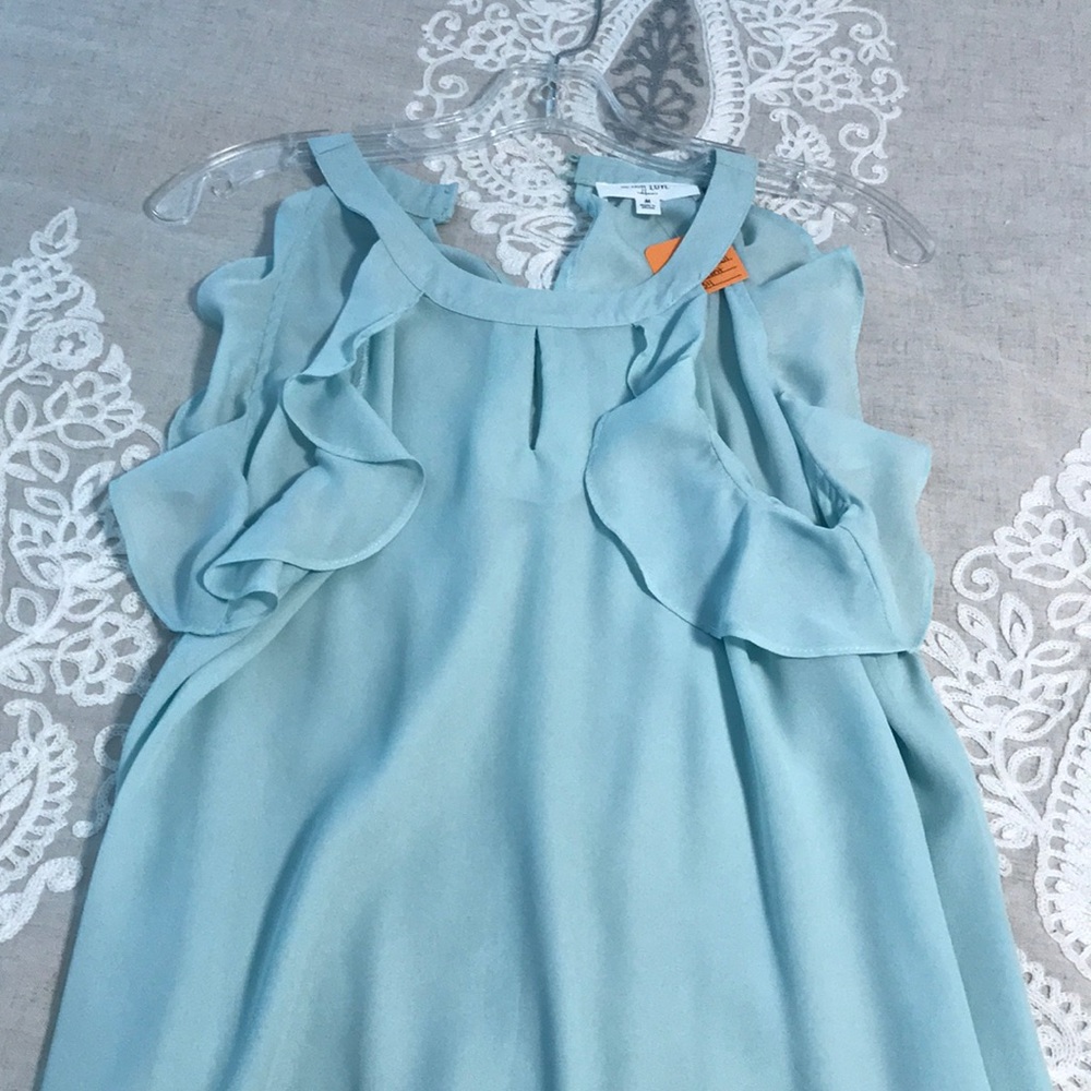 Mint colored flowy ruffle top